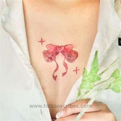 tattoos between boobs|Between Breast Tattoo Meaning: Personal Stories and。